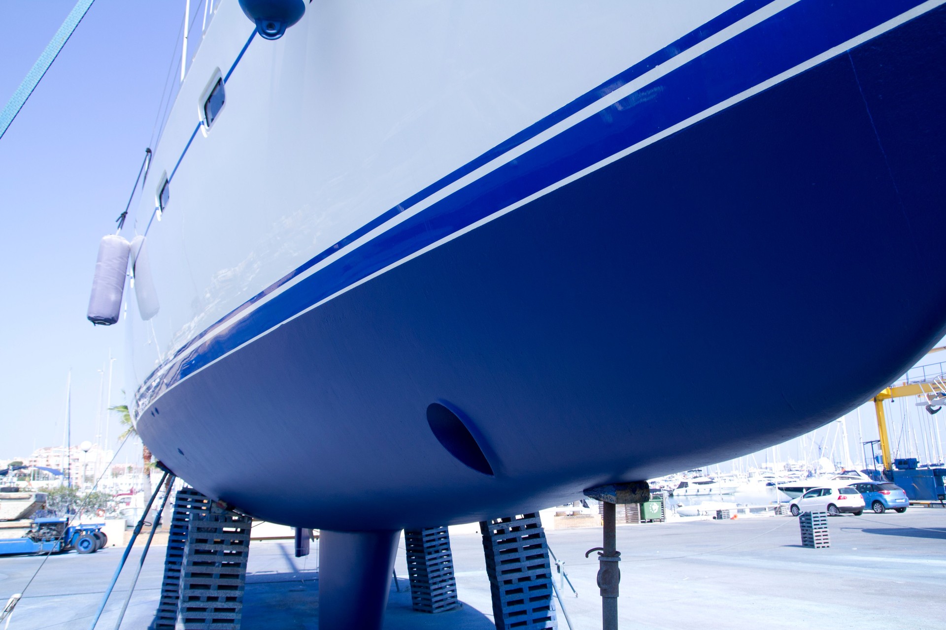 boat hull sailboat blue antifouling beached for paint